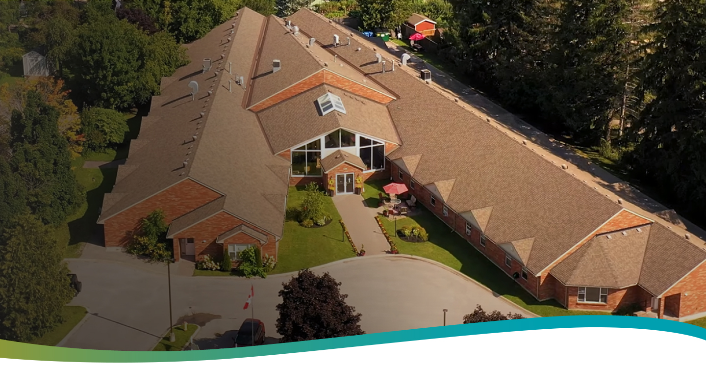 Aerial view of the front entrance and wings of Atrium Retirement Residence in Orillia.